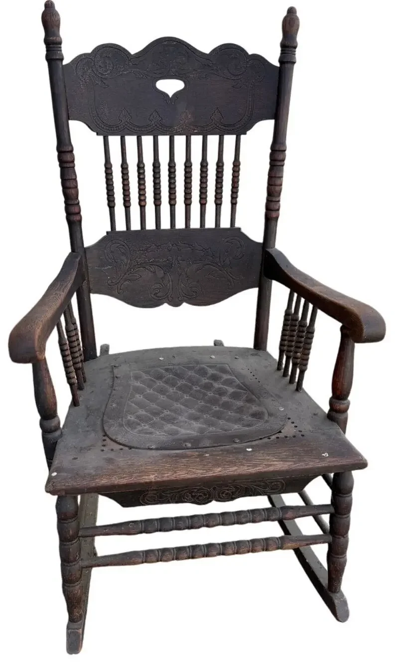 Antique Spindle Rocking Chair With Carvings and Cutout accent
